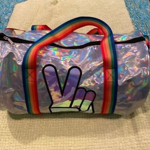 Metallic silver duffle bag.